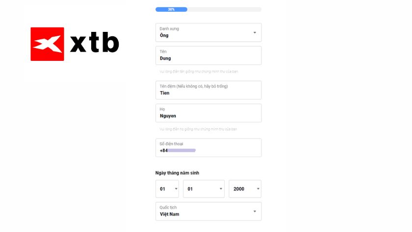 Hướng dẫn điền thông tin cá nhân chi tiết khi đăng ký tài khoản XTB Form điền thông tin cá nhân trên trang đăng ký XTB, bao gồm tên, họ, số điện thoại với mã vùng quốc tế